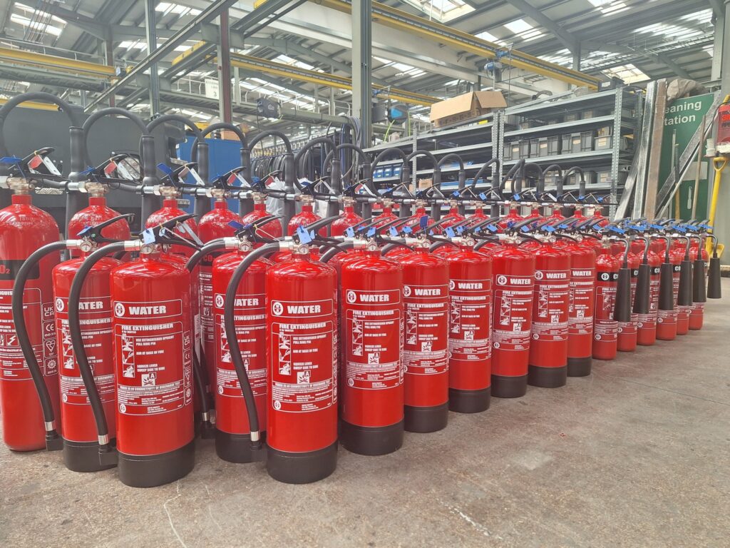 Solve Fire Safety's large stock of new water and CO2 fire extinguishers ready for commercial installation in Monaghan.